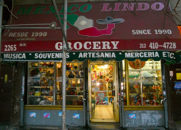 Mexico Lindo Grocery The shop front of a Mexican grocery store in New York, showing the range of things available from music and souvenirs, to food and convenience items