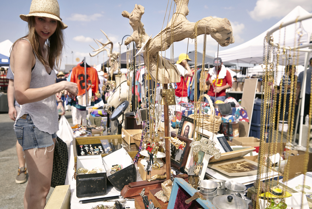 While exploring NYC neighborhoods, make sure to check out the open-air flea market in Williamsburg.