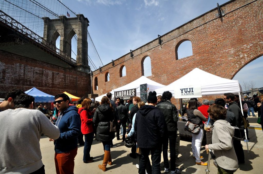 people hanging out at Smorgasburg in New York City.