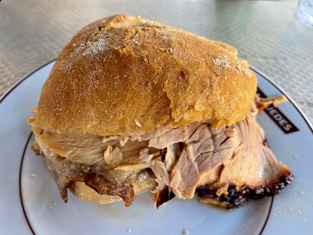 Sandes de pernil, a delicious sandwich made with pork shoulder