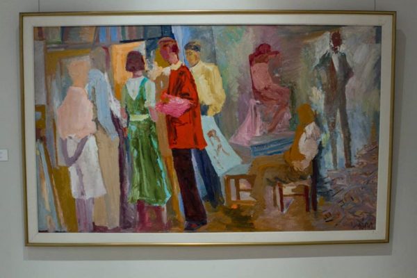 Several people, painted with soft red, green, pink and blue tones, stand and converse in an abstract social gathering.