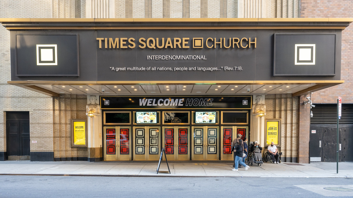 The facade of Times Square Church, a former theatre that is now home to performances and multicultural experiences.