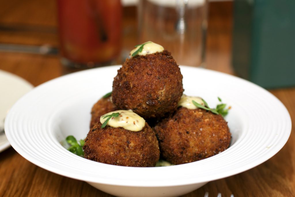 Bitterballen, or Dutch meatballs are famous Amsterdam street food.