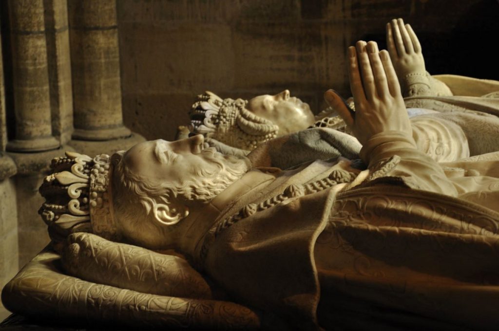 Two statues of a man and a woman at Saint-Denis, one of the famous churches in Paris.