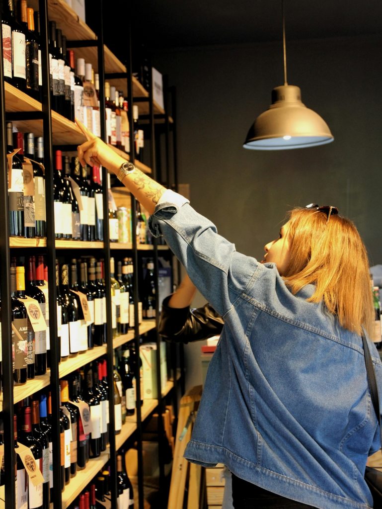 woman shopping for French wine