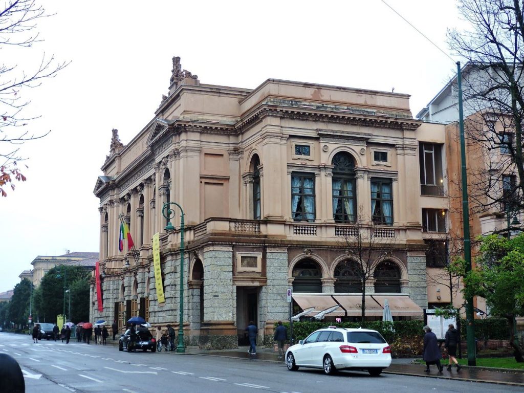 People walking near the Donizetti Theater in Bergamo, Italy.