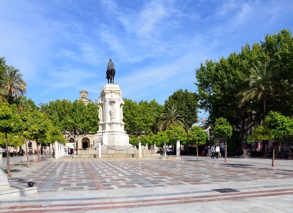 People walking around Plaza Nueva.
