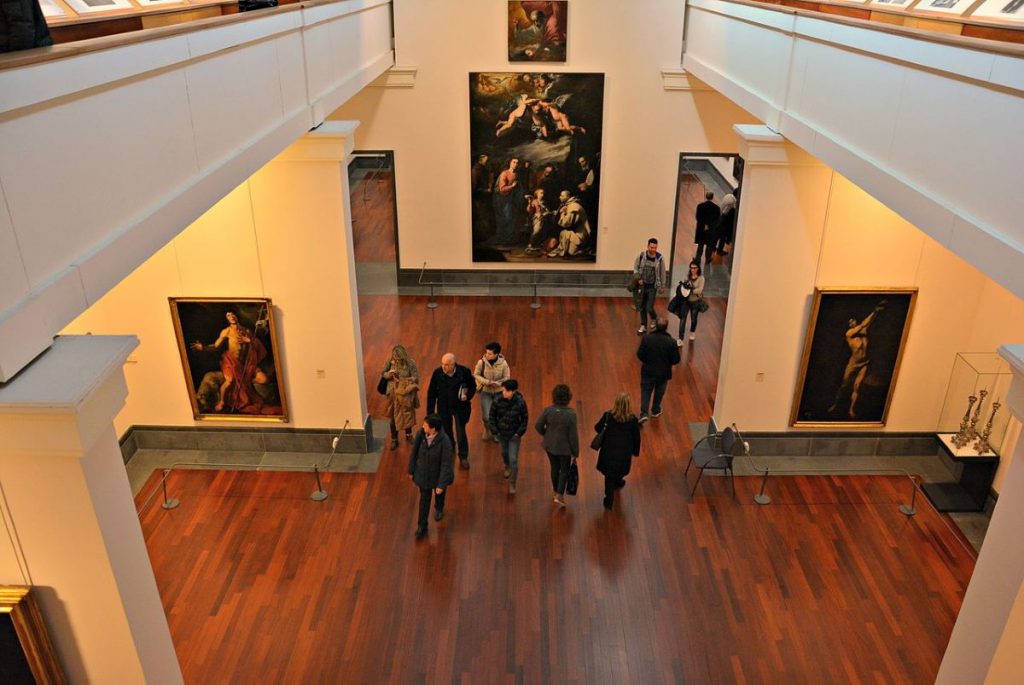 People walking around Museo Nazionale di Capodimonte.