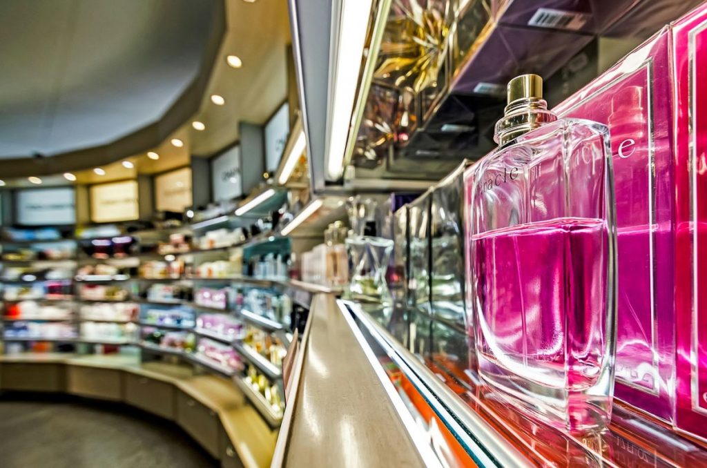 A row of perfume at a French shopping market.