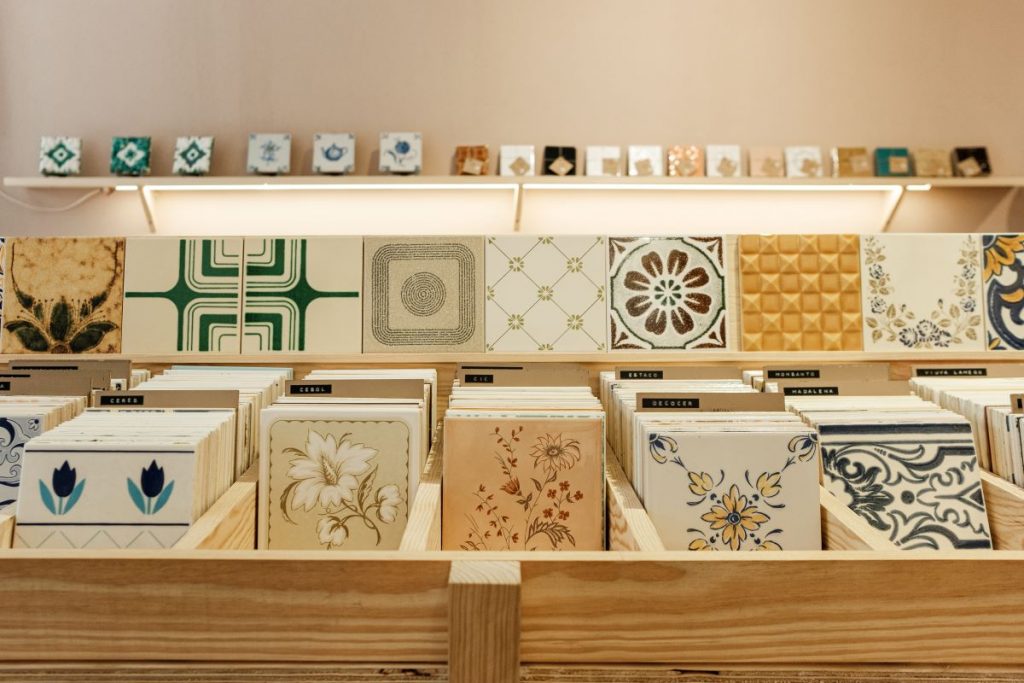 An assorted range of traditional tiles on display in a local shop in Lisbon