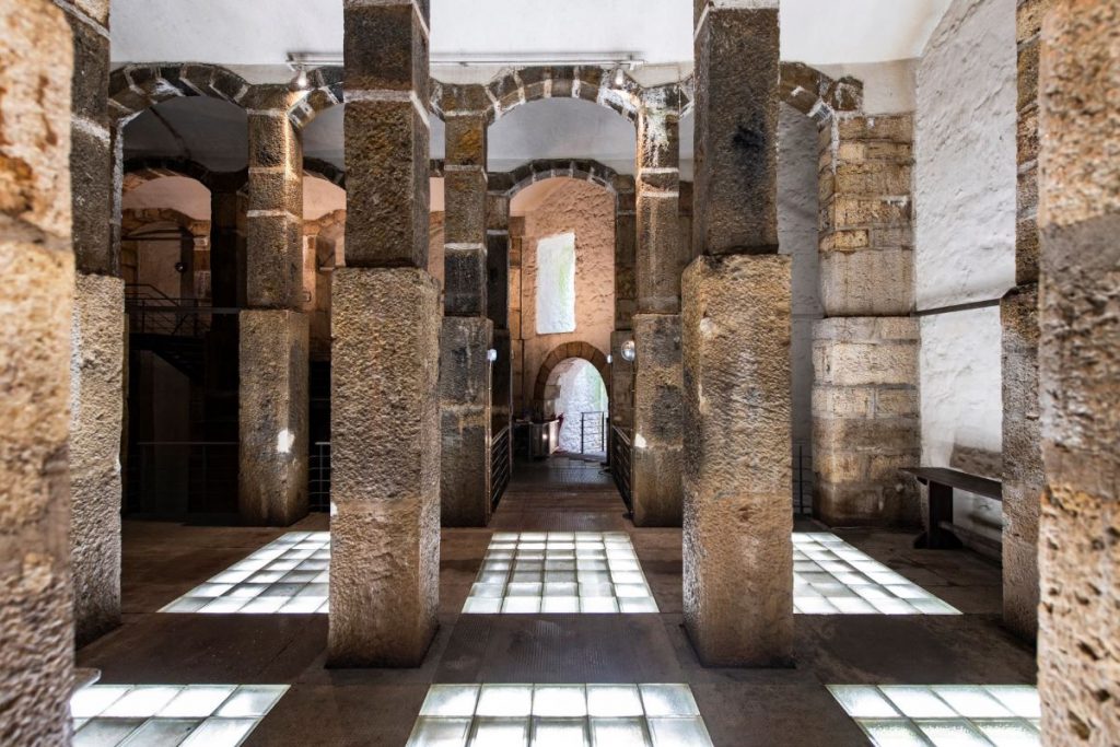 underground in the Mãe d'Água das Amoreiras Reservoir there are stone columns and vaulted ceilings