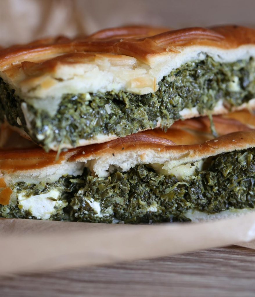 Spanakopita on a table in Astoria, Queens.