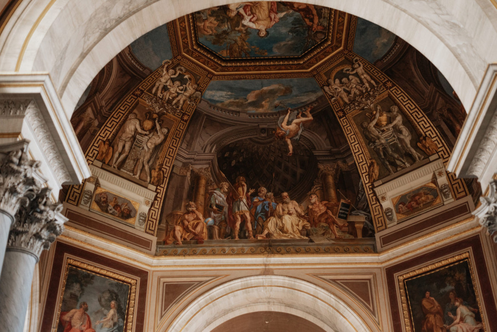 Raphael’s fresco, The School of Athens, depicts philosophers on the arched wall of the Vatican’s Apostolic Palace.